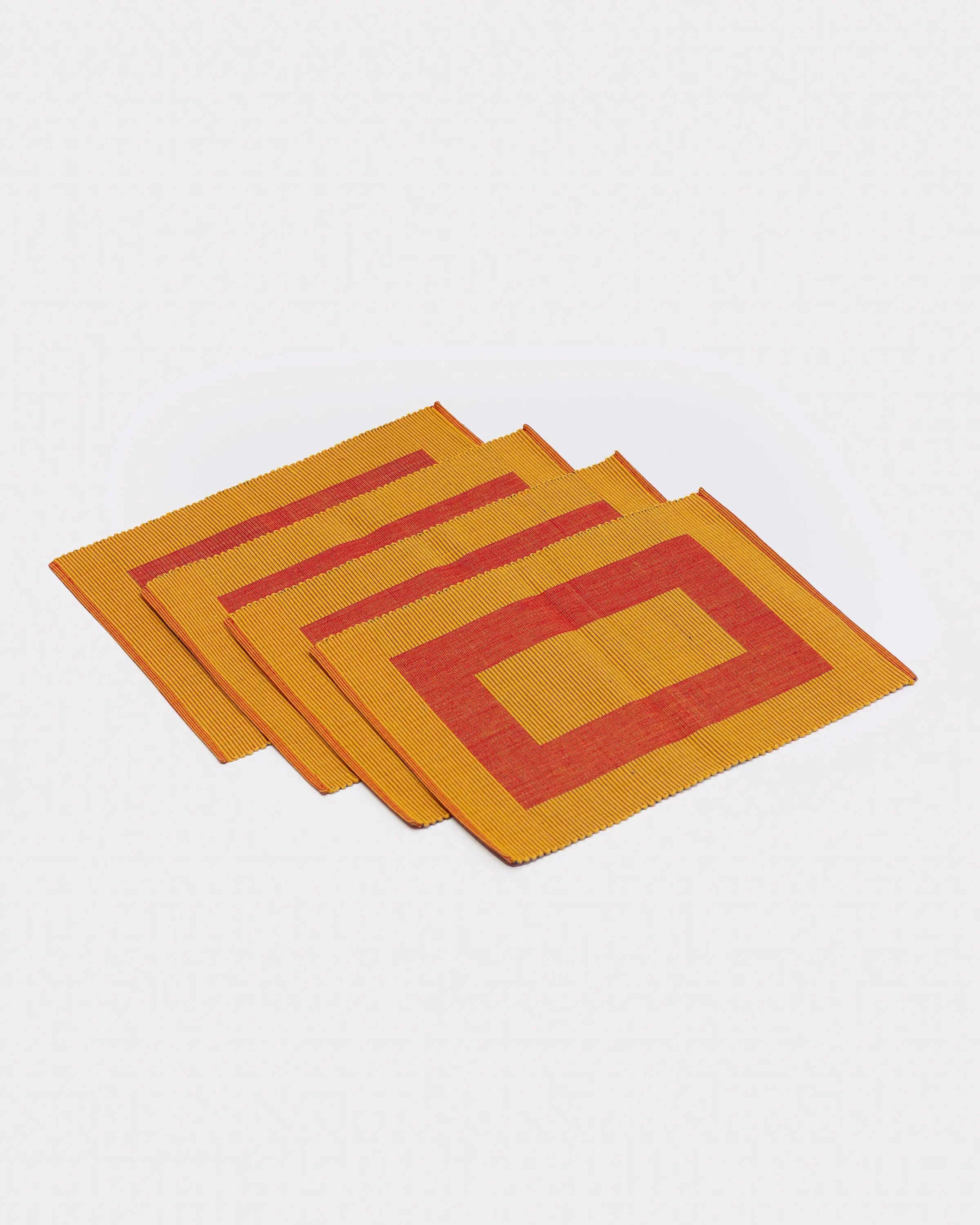Set of reversible orange and yellow reversible placemats - handwoven by Sri Lankan artisans