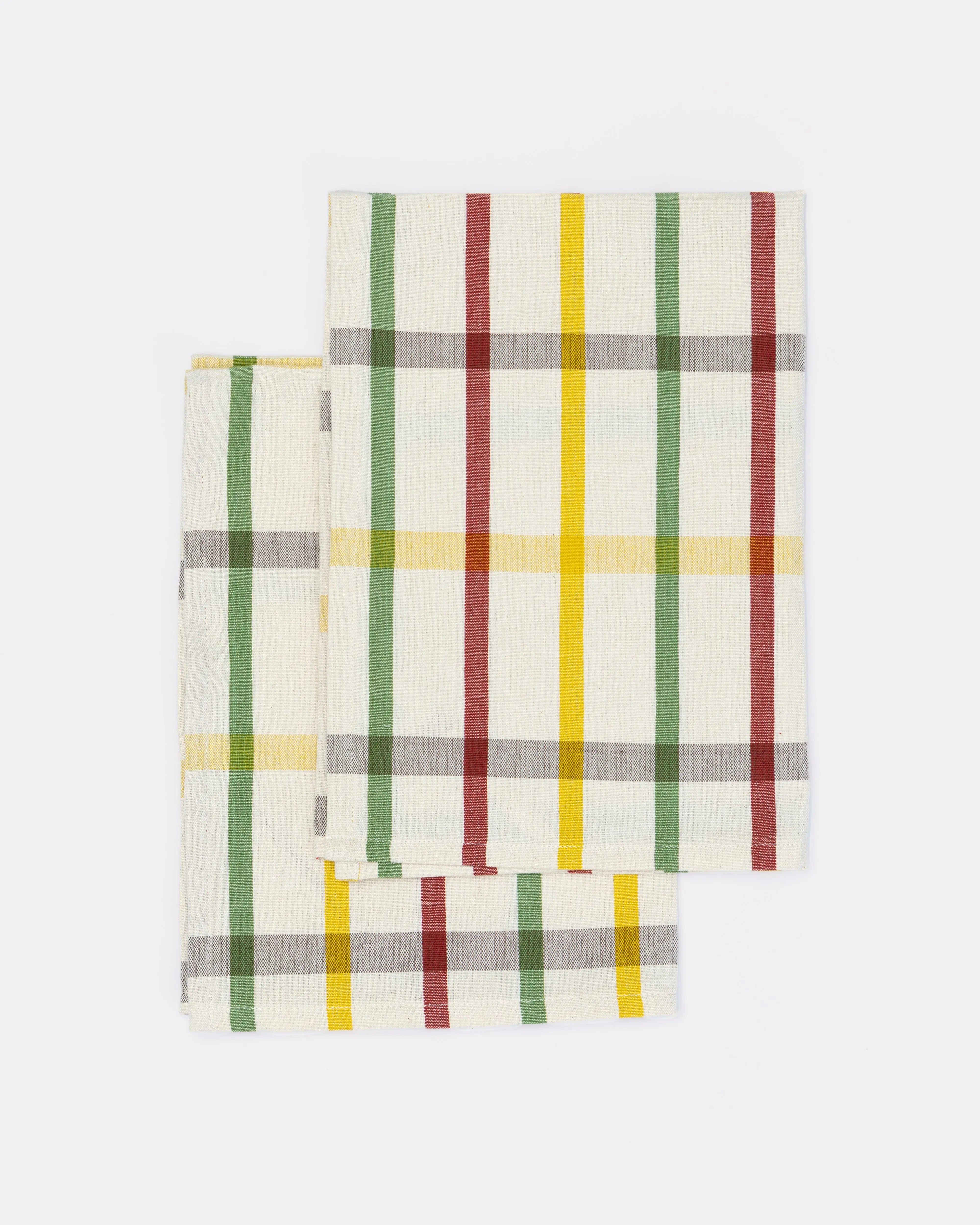 Set of plaid towels with green, yellow, and red stripes on a white background